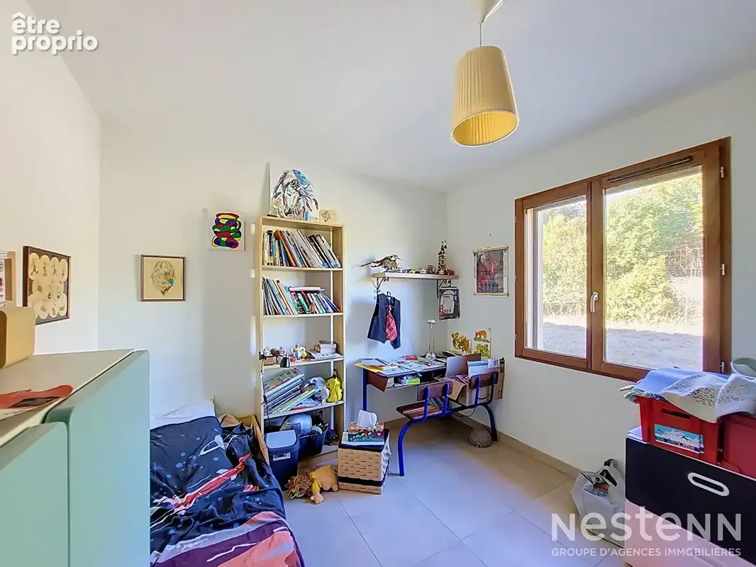 A Vendre Maison contemporaine de plain-pied, double garage, Carport et terrain de 1 731 m². - photo 9