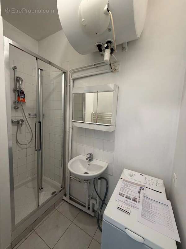 PARIS 6ᵉ – RUE DE RENNES – Un petit appartement qui a tout d'un grand ! - photo 12