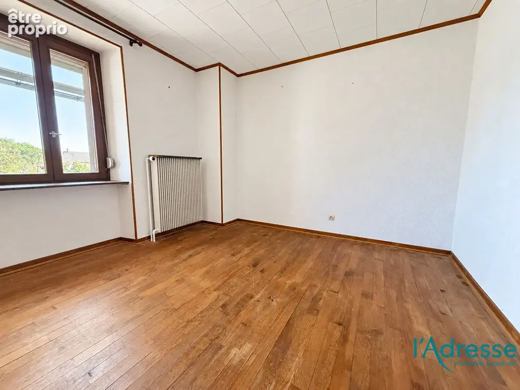 Maison mitoyenne de 91,17 m² avec jardin et dépendance - photo 7