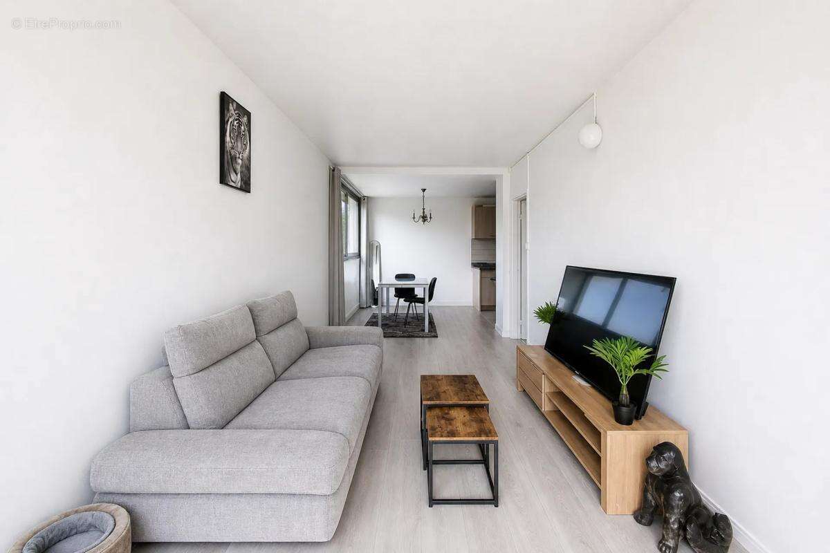 Appartement type F3 avec double séjour - photo 15