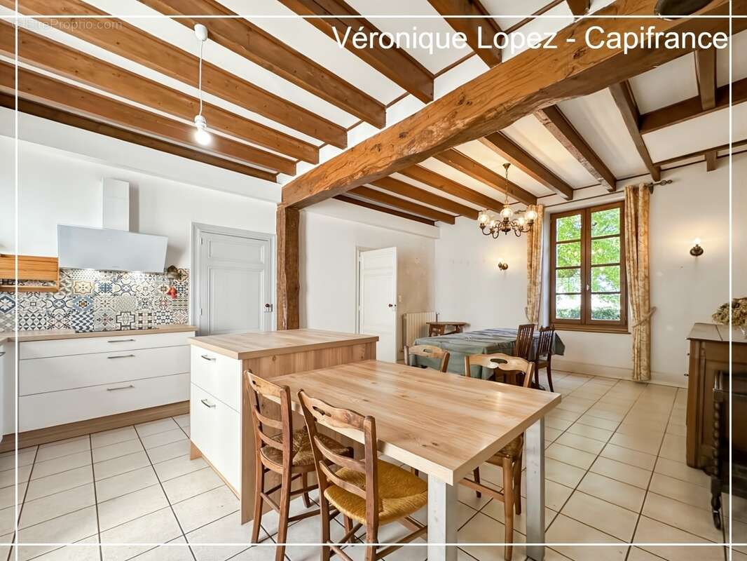 Agen, à seulement 6kms, authentique maison en pierre de 203m² avec grand terrain, garage et cave - photo 4