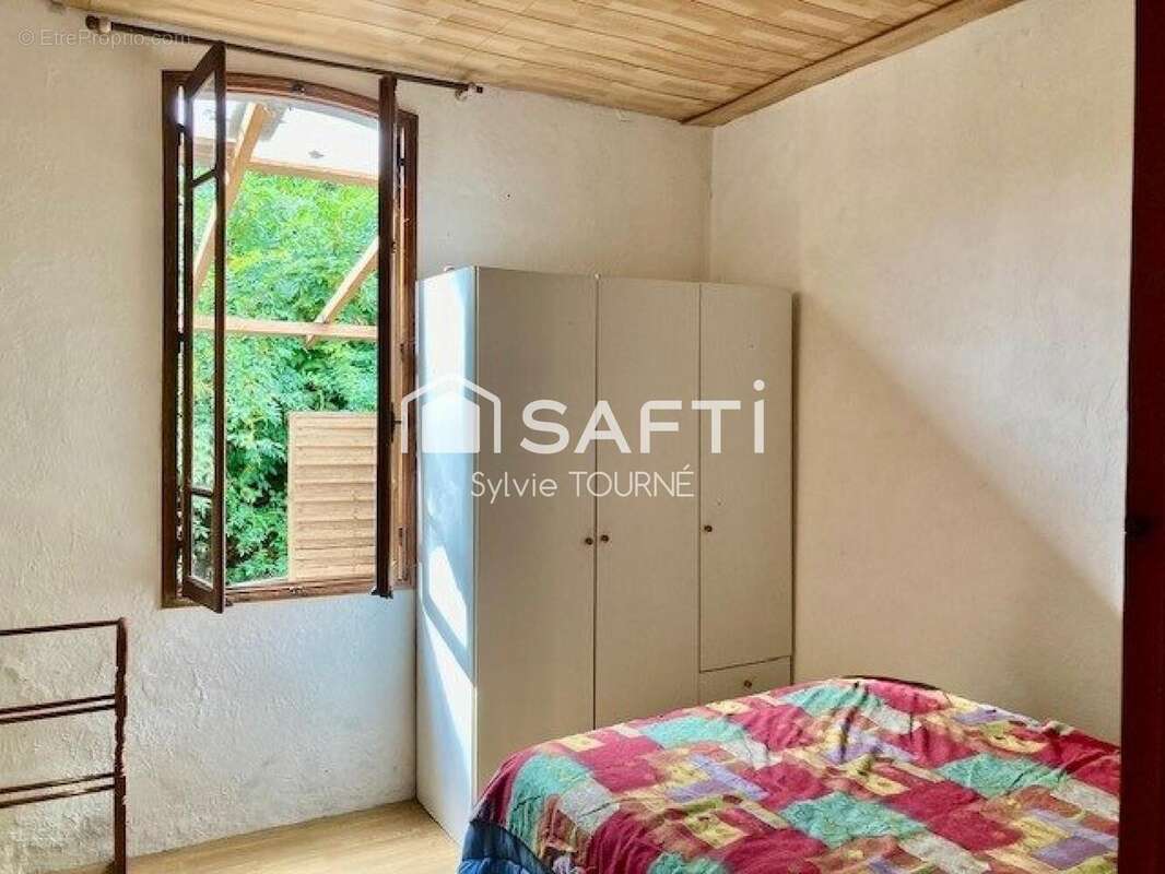 Maison 99 m² à Cazaubon  - photo 7