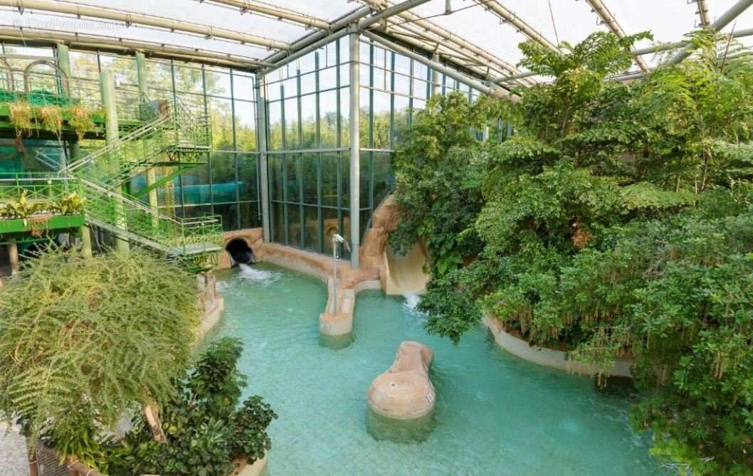INVESTISSEMENT LOCATIF  CHAMOUILLE  Résidence tourisme Center Parcs Le Lac d'Ailette  6,32 % de rentabilité - photo 7