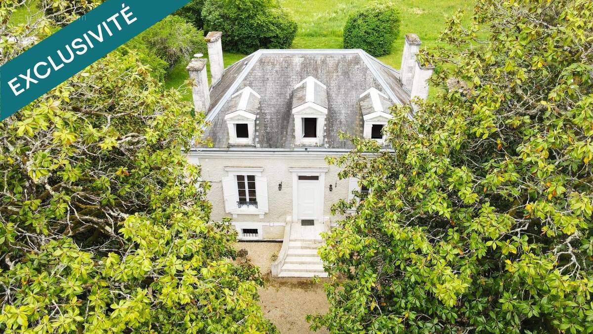 Photo 1 - Maison à ANTONNE-ET-TRIGONANT