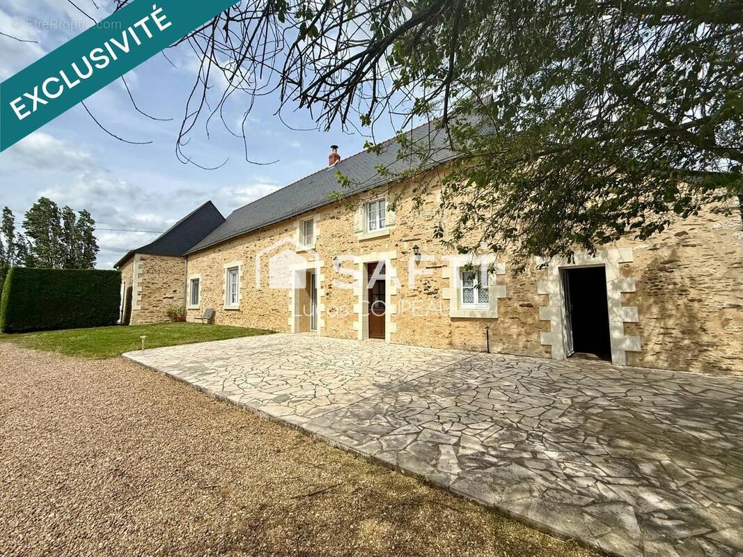 Photo 1 - Maison à CHAMPIGNE