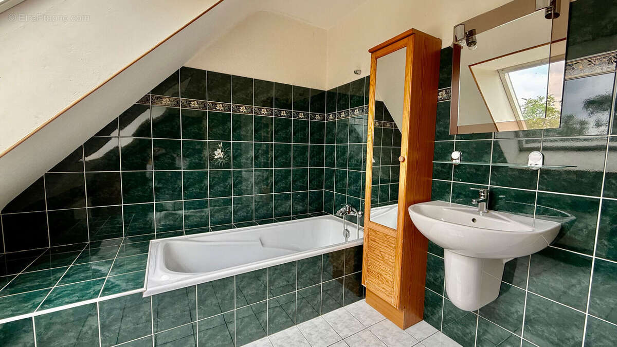 Maison 90 m2 - véranda - terrain de 1100m2 - GUILERS - photo 8