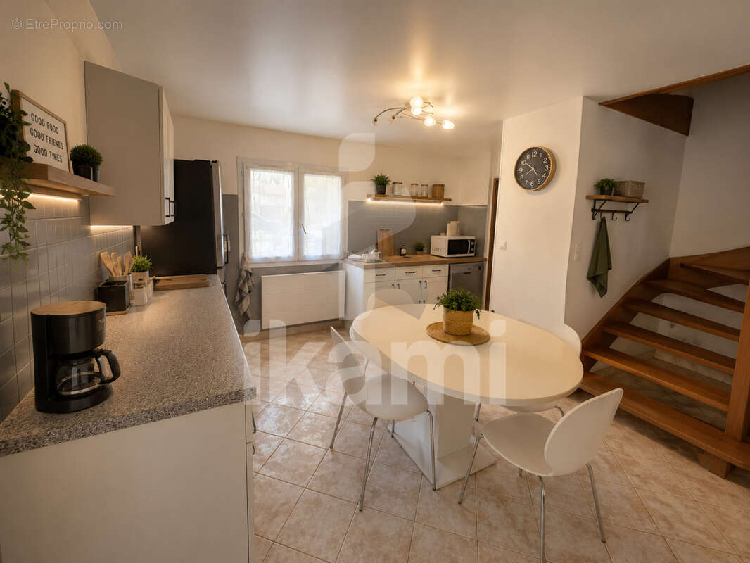 Une maison aux multiples possibilités - photo 5