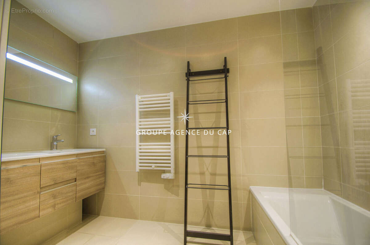 Appartement en rez de jardin dans residence - photo 6