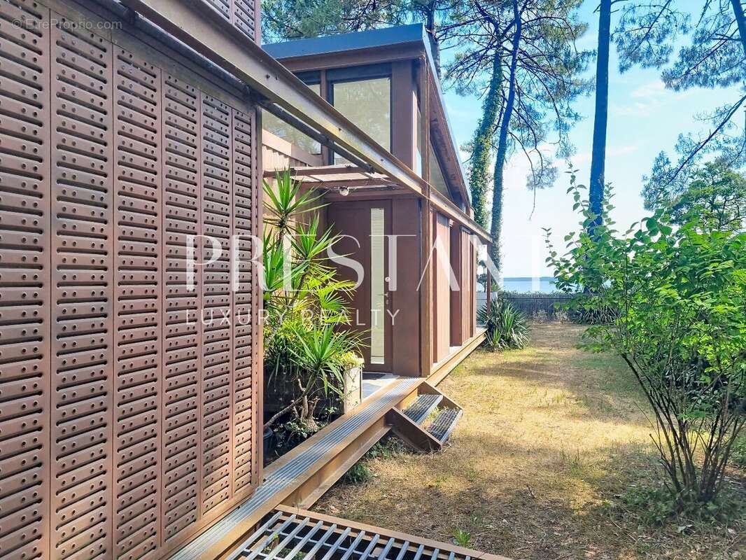 Villa d'architecte unique en première ligne face au lac de Lacanau - photo 3