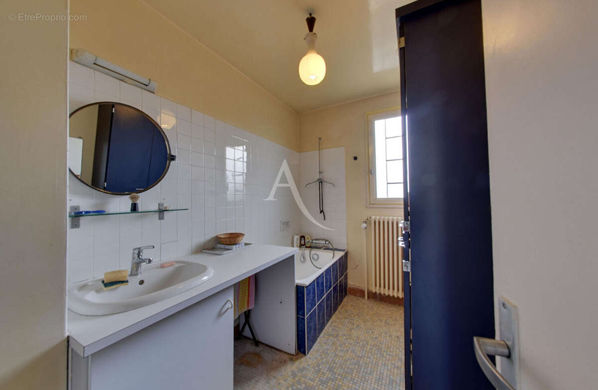 Maison familiale avec fort potentiel et grand jardin - photo 9