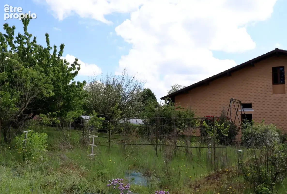 Jolie villa de 117 m² à fort potentiel avec un beau terrain arboré à CURCIAT DONGALON (01) - photo 5