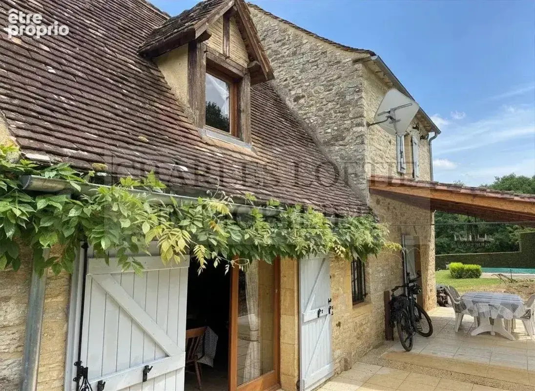 Charmante maison en pierre avec piscine, sur un terrain de 3800 m² , aux portes d’un village vivant de la Bouriane. - photo 3