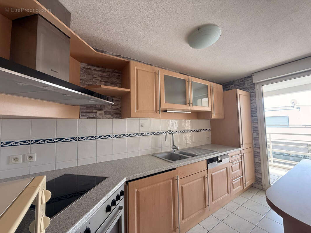 À vendre   Appartement 3 pièces de 70 m2 à Huningue - photo 3