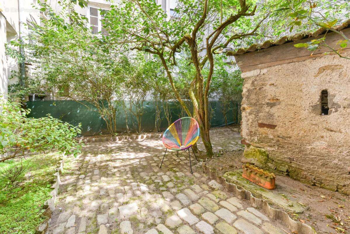 Appartement 2 pièces de 49 m² à Nantes quartier Talensac avec cour arborée - photo 10