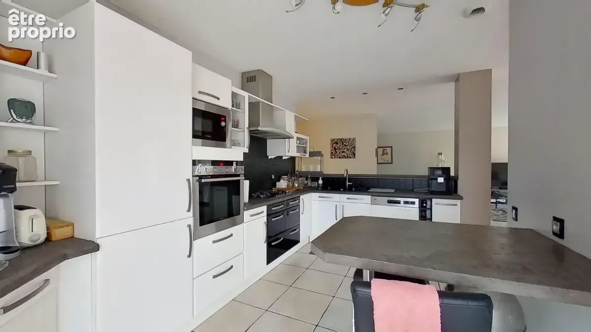Maison 5 pièces 141 m² à vendre à Bron (69500) - photo 6