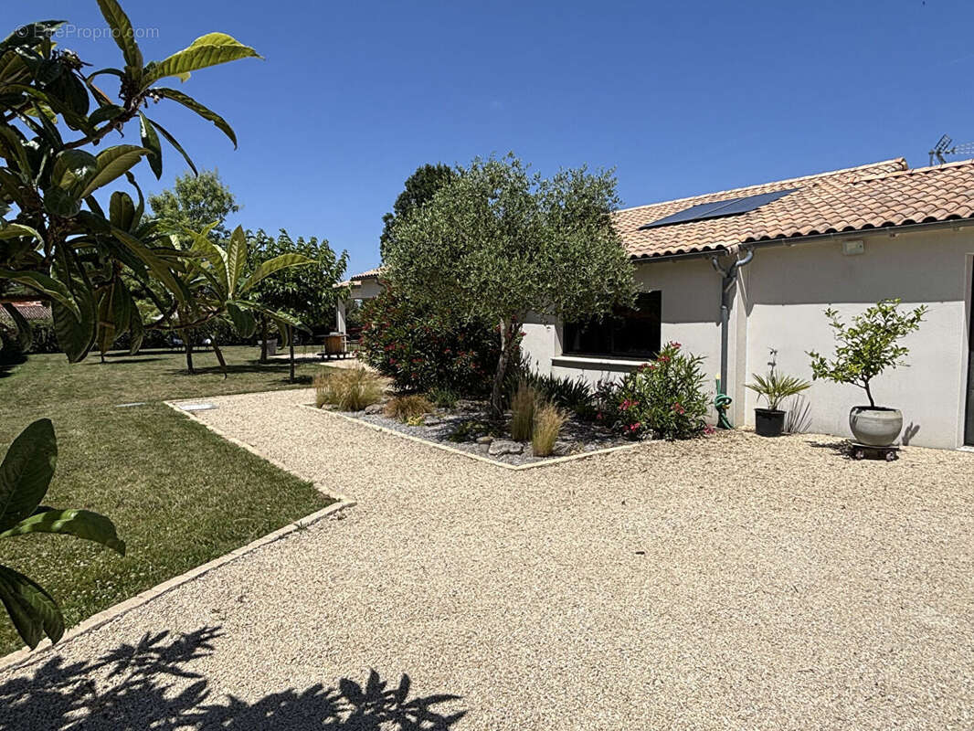 Maison de plain-pied de186 m2 - photo 3