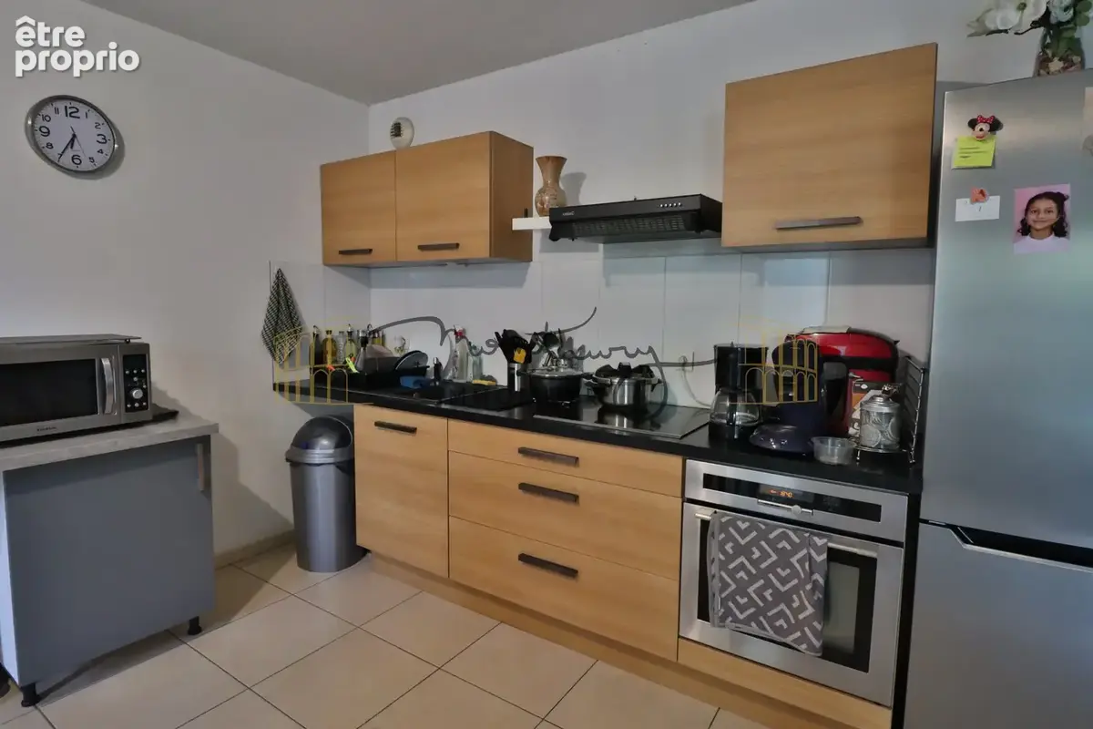 A vendre a nimes maison avec garage et jardinet - photo 4