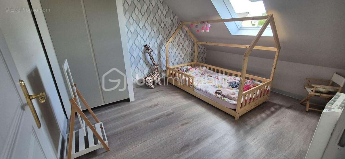 BEAUCÉ – Maison rénovée de 105,48 m² avec vie de plain-pied, sous-sol complet et terrain clos de 492 m² - photo 15