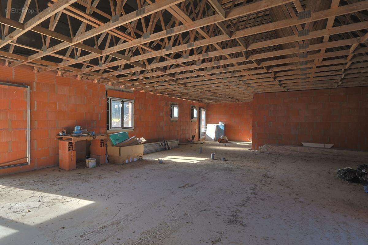 Maison de plain pied de 130m² - photo 2