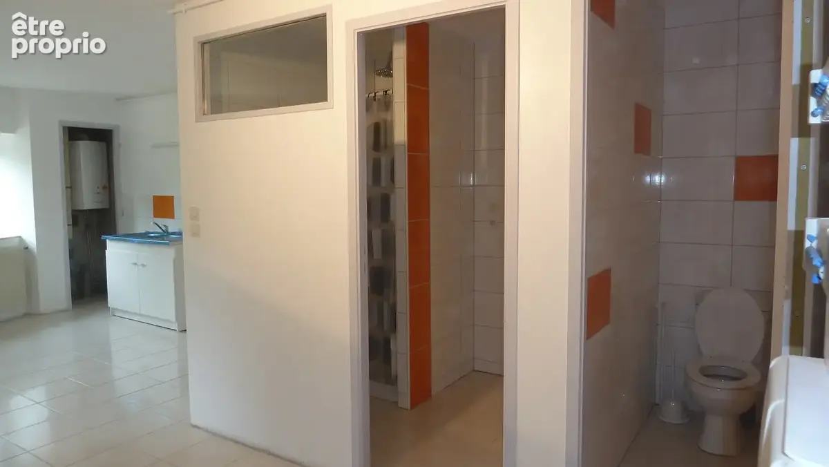 Proche centre-ville, immeuble de rapport avec  4 appartement et  12  lots de parkings. - photo 9