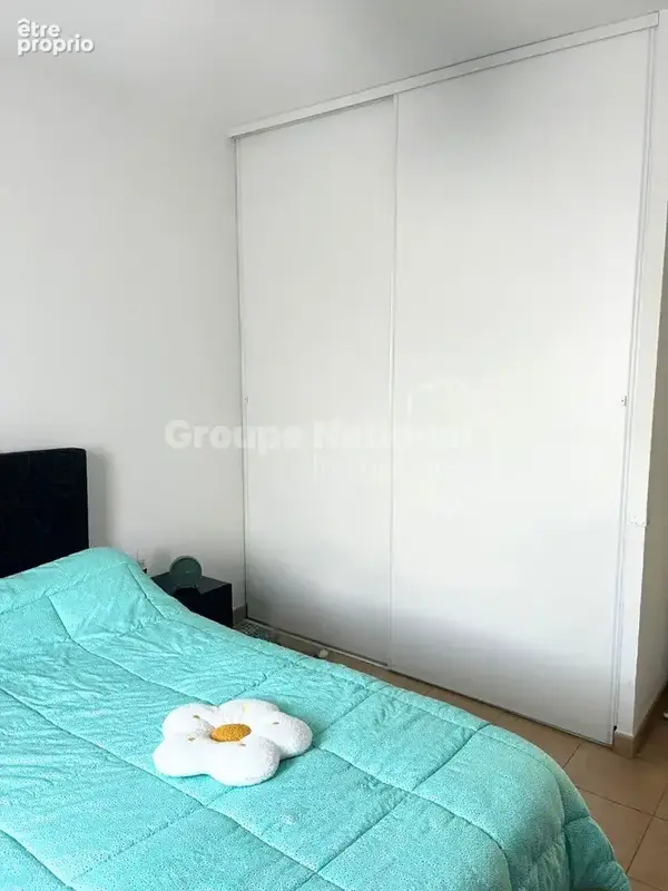 T2 de 44m² climatisé et traversant + 2 places de parkings privatives dans une copropriété prisée - photo 10