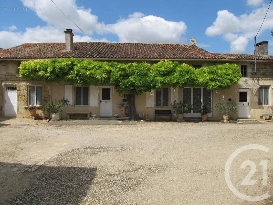 Maison à AUBIGNE