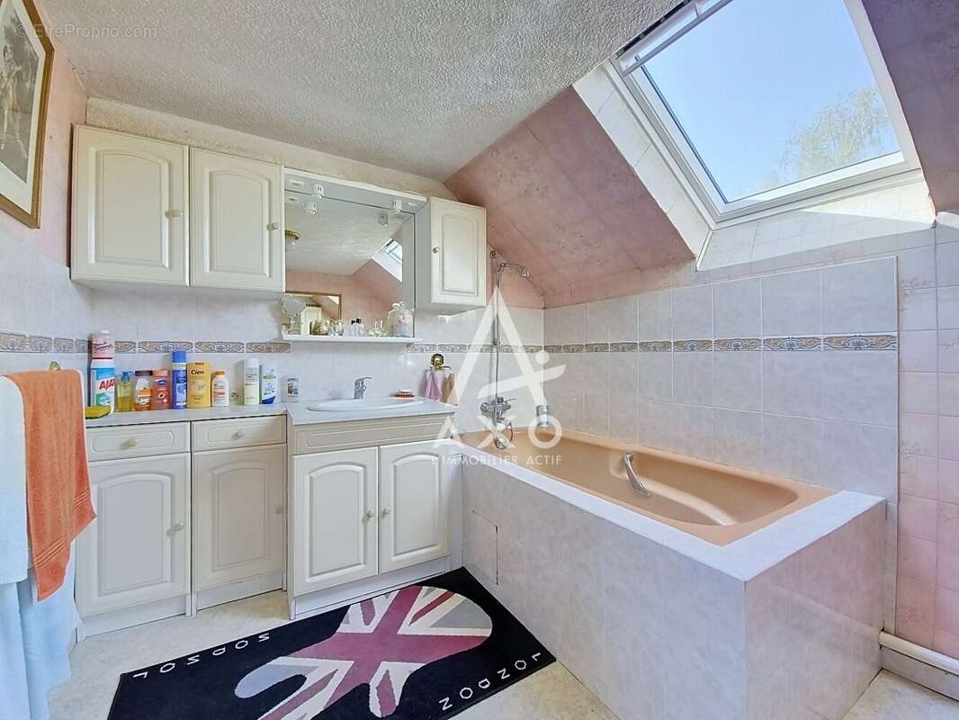 Maison en brique à Auneuil avec 2 chambres, véranda et jardin clos - photo 9