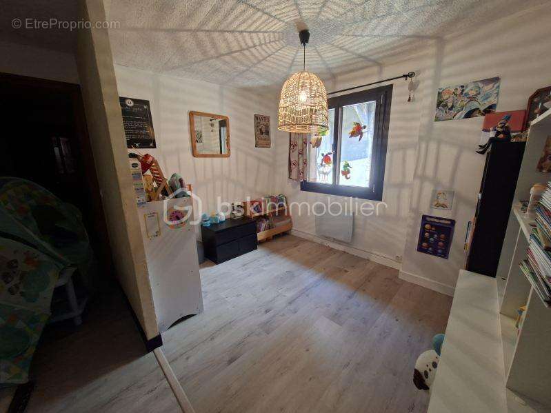 Appartement T4 de 86 m² avec jardin et cave - photo 9