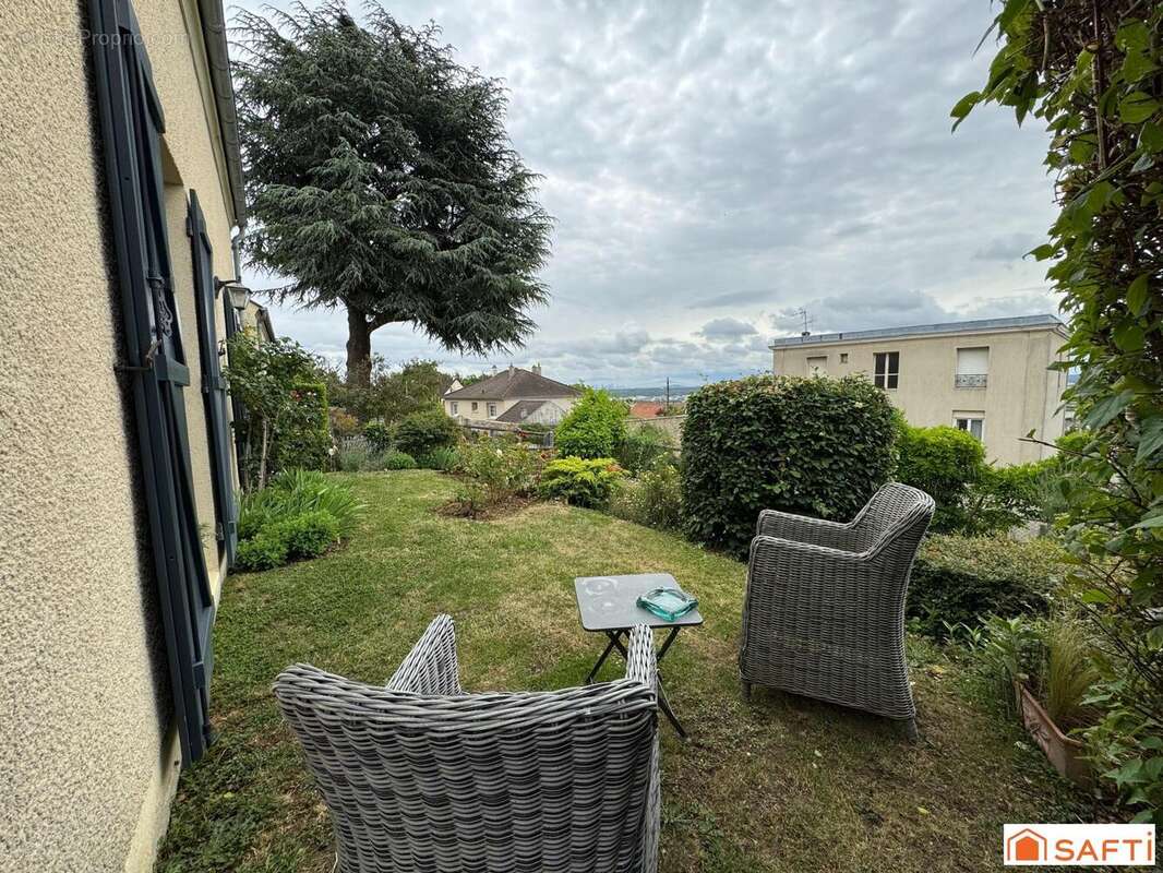 Photo 3 - Maison à CHANTELOUP-LES-VIGNES