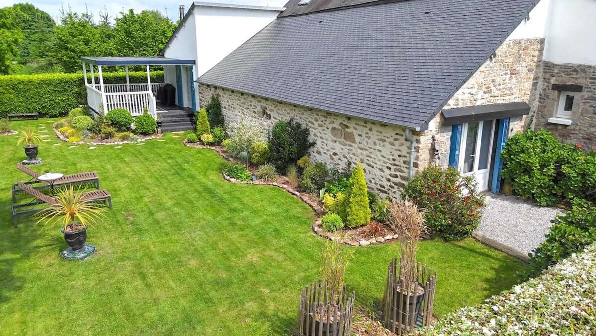 Maison de 7 pièces de 235 m² à Le Mené - photo 28
