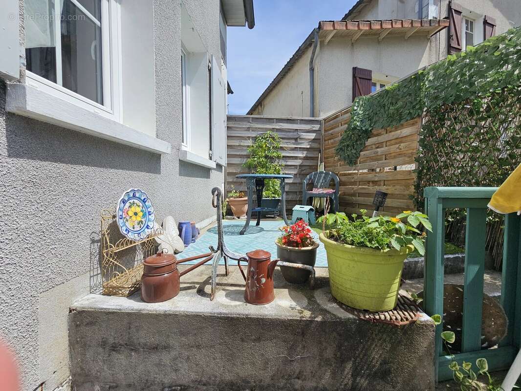 Charmante maison de ville avec jardin - photo 12
