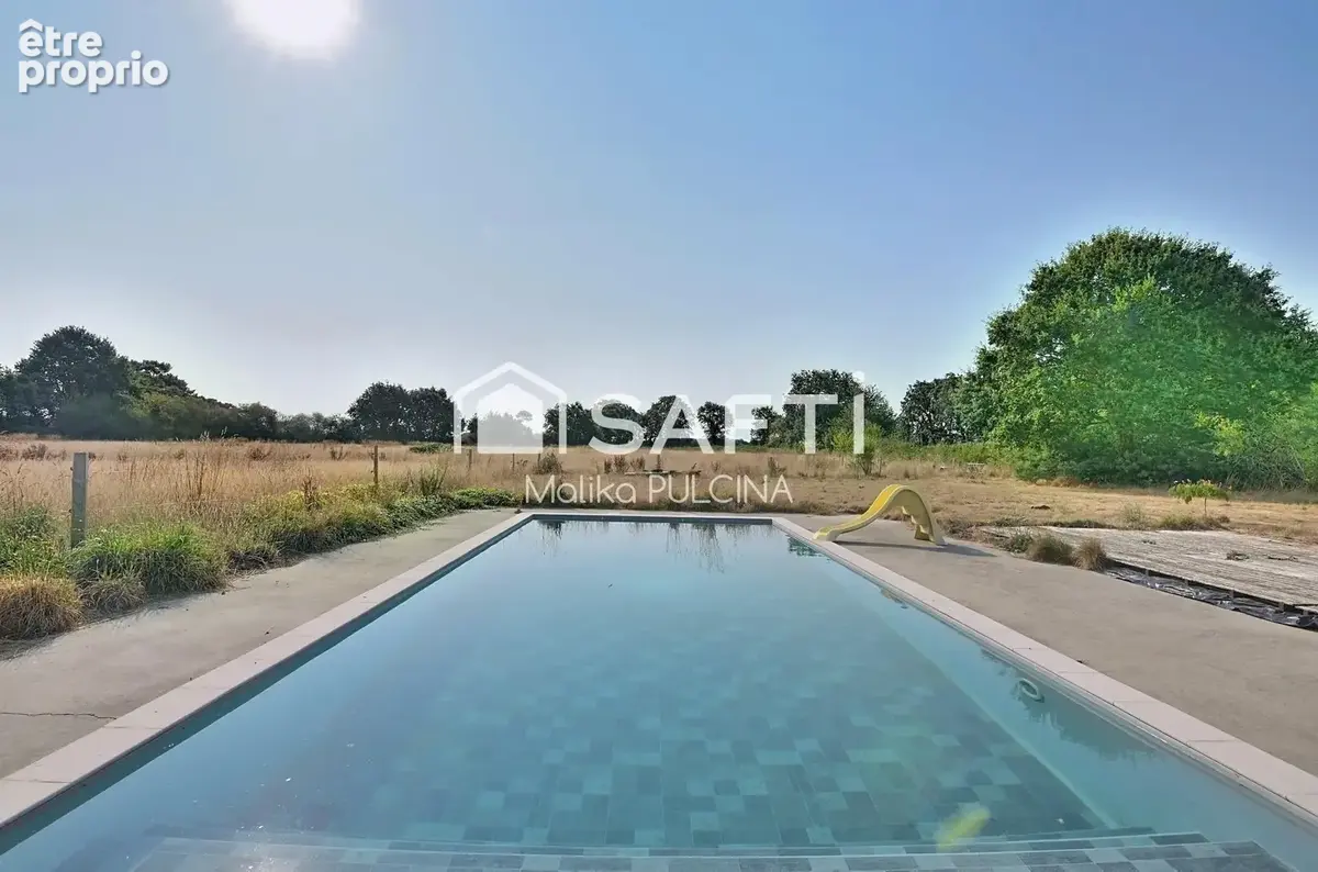 Photo 1 - Maison à SAINT-JULIEN-DES-LANDES
