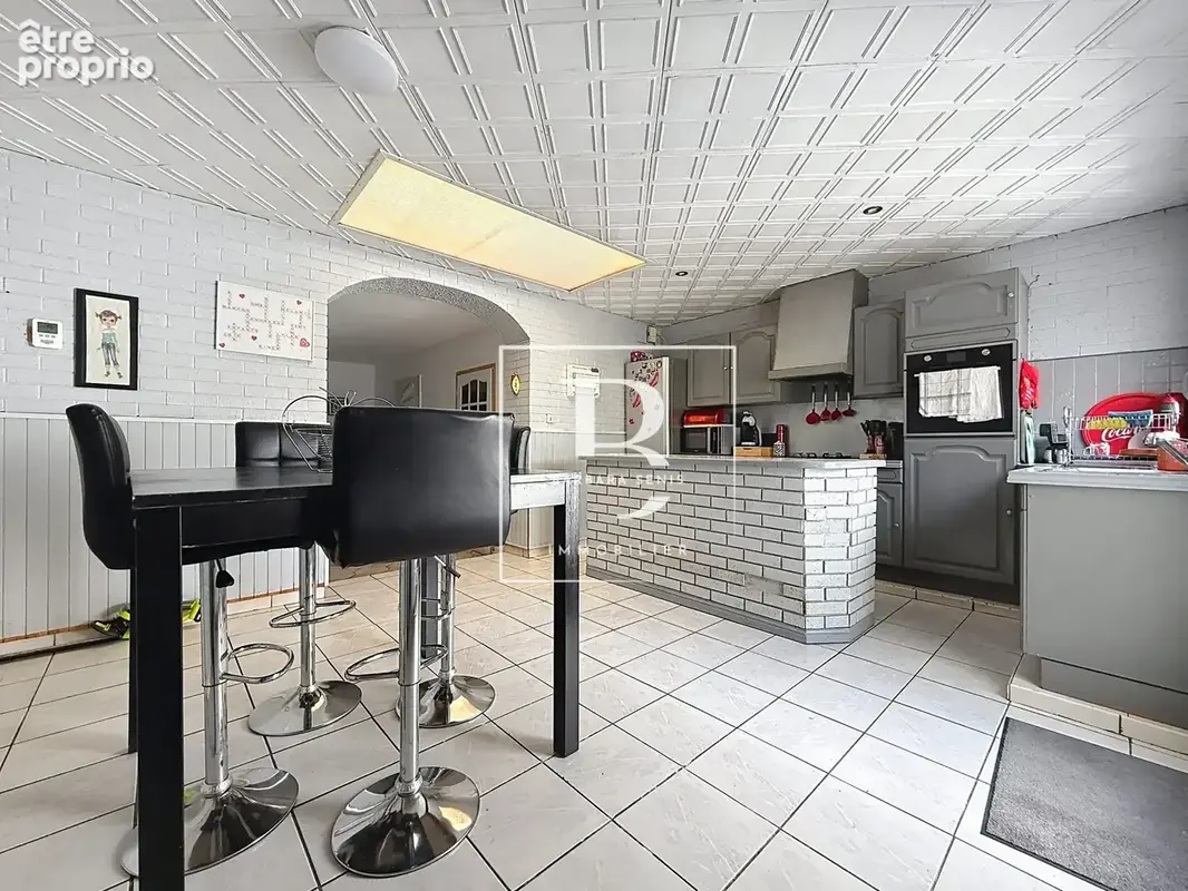 Maison 5 pièces 118 m² à vendre à Douchy-Les-Mines (59282) - photo 4