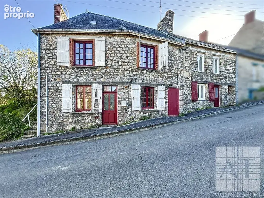 Maison à JUVIGNE