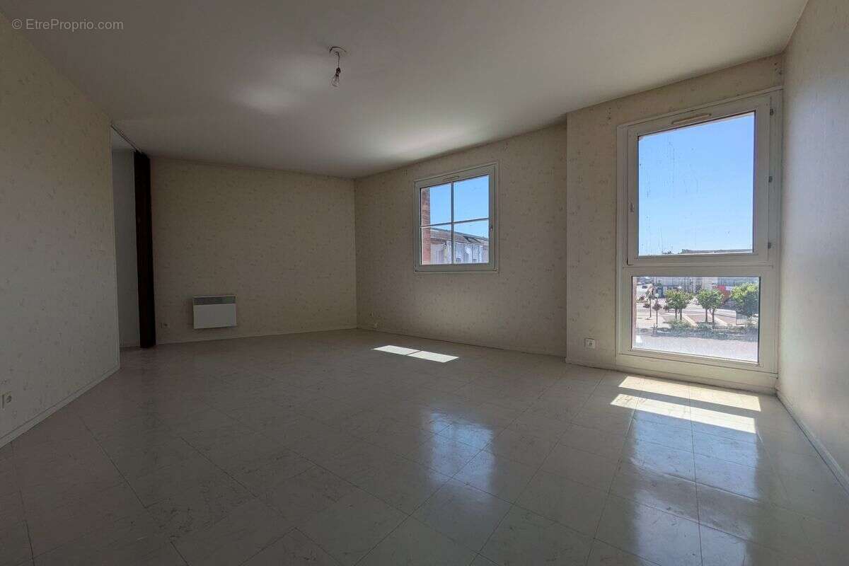 A vendre - romilly sur seine – 26 place des martyrs de la liberation porte n 06 etage n°3 - photo 4