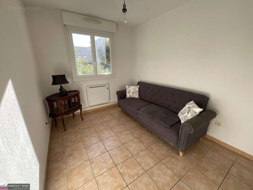 Agréable appartement T3 offrant 51 m² avec terrasse de 6 m² en rez-de-jardin d'une résidence sécurisé avec des espaces verts des - photo 7