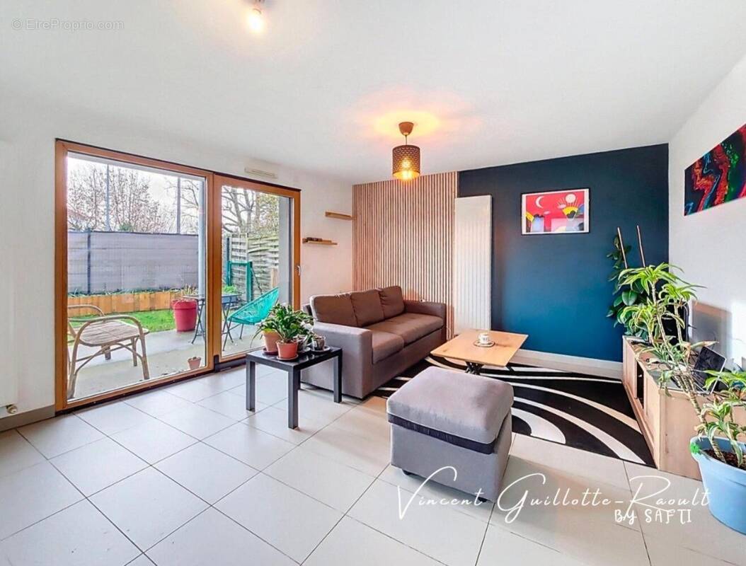 Photo 1 - Appartement à BOUGUENAIS