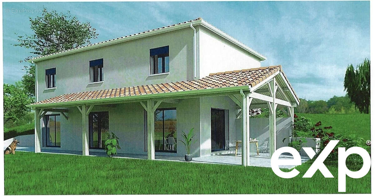 Une maison moderne à deux étages avec un toit en tuiles rouges, une terrasse couverte, entourée de verdure et d'un vaste jardin. - Terrain à LA SAUVETAT-DE-SAVERES