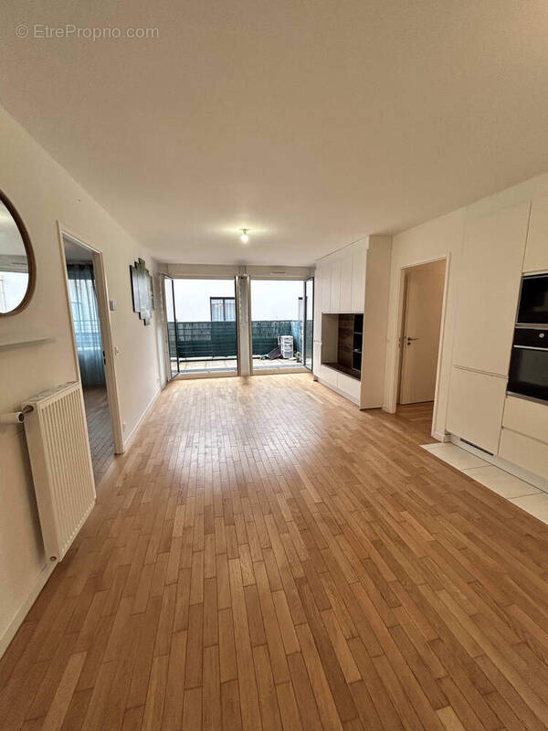 Photo 1 - Appartement à VOISINS-LE-BRETONNEUX