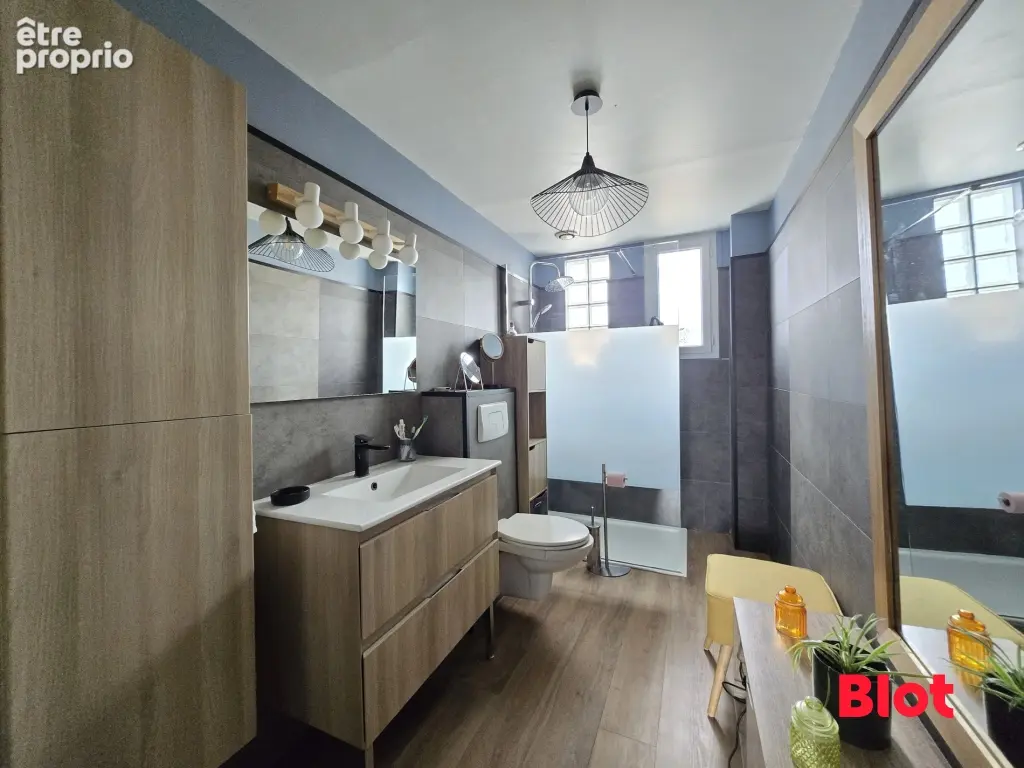 Maison 8 pièces 165 m² à vendre à Trignac (44570) - photo 4
