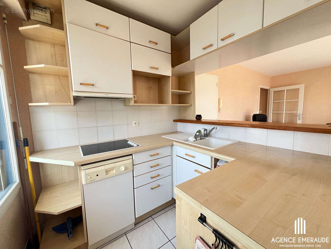À vendre à Dinard appartement T2 en rez-de-jardin avec stationnement et cave - photo 5