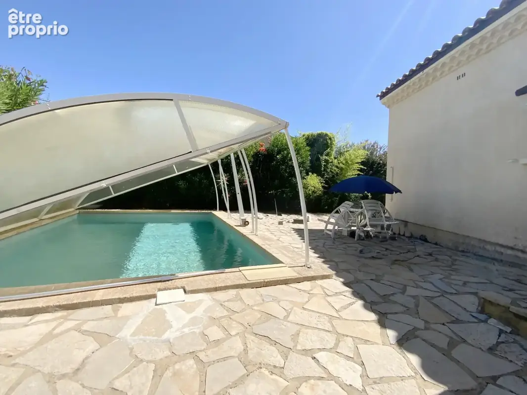 Villa cossue située à Uzès avec terrain de 1400 m2 avec piscine. - photo 6
