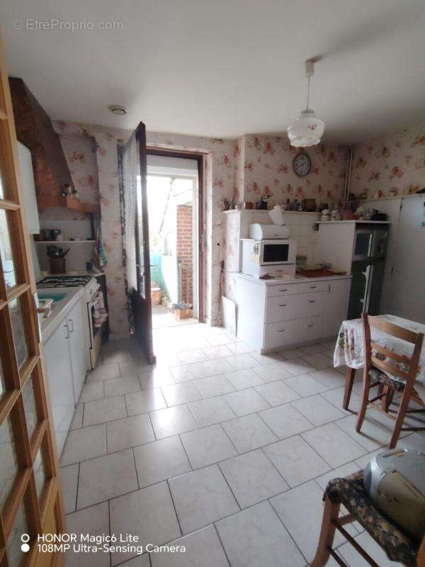 Maison à AZE