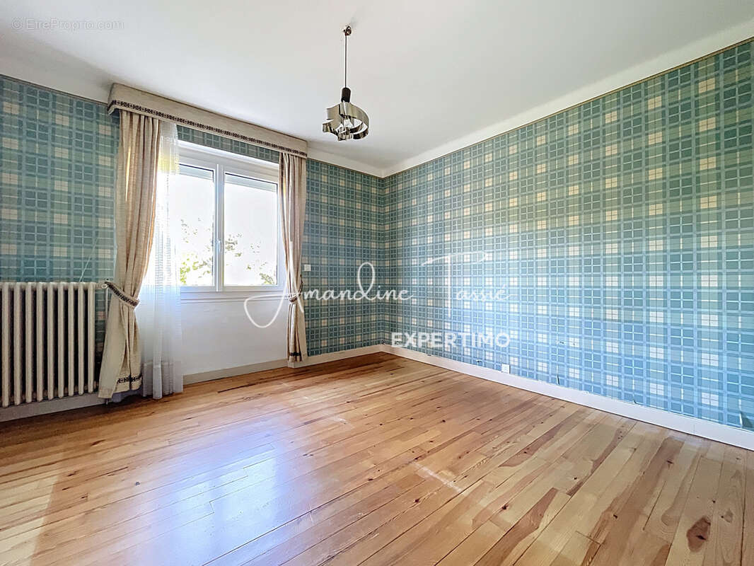 Maison familiale avec potentiel locatif et son terrain d'environ 2000m2 - photo 8