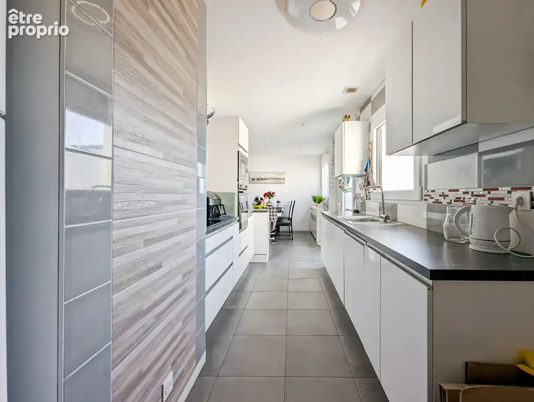 A vendre  SAINT AUBIN D AUBIGNE  maison familiale 4 chambres - photo 5