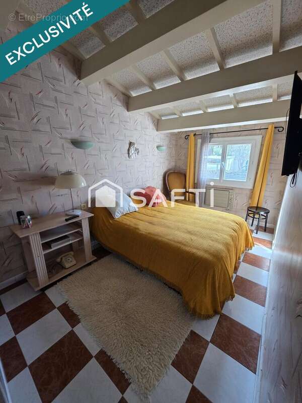 Photo 5 - Maison à SAINT-MITRE-LES-REMPARTS