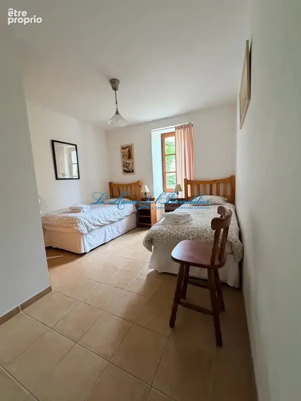 CANAULES, dans une maison en pierres de caractère, appartement T3  au 1er étage avec terrasse privée - photo 5