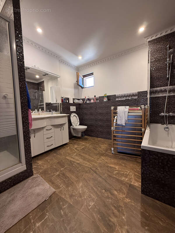 Pavillon t8 - centre ville - photo 8
