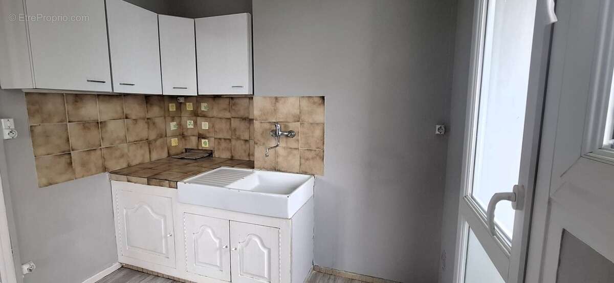 Appartement 2 pièces à vendre dans résidence recherchée avec Ascenseur, Quartier Remicourt SAINT QUENTIN (02) - photo 9