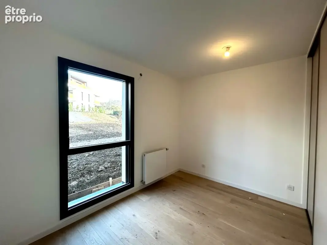 À vendre – Appartement T2 en rez-de-jardin avec terrasse et jardin à Ambilly (74) - photo 2